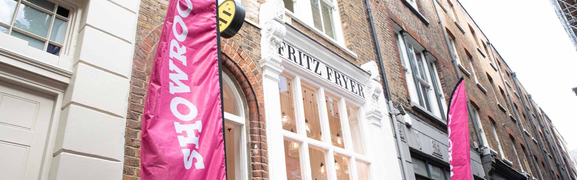 Fritz Fryer Clerkenwell showroom featuring Clerkenwell Design Week pink banners