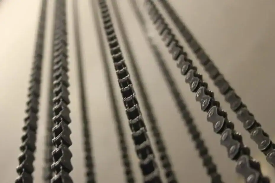 Metal chain links for lighting fixtures at Fritz Fryer UK.