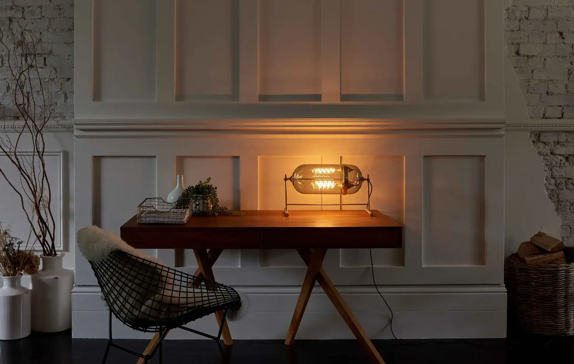 Industrial table lamp with warm glow.