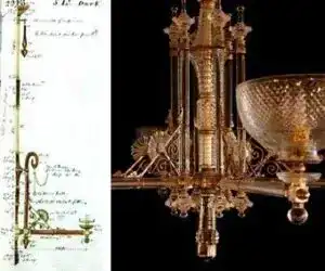 Elegant chandelier with intricate design and crystal details, showcasing luxury lighting fixtures.