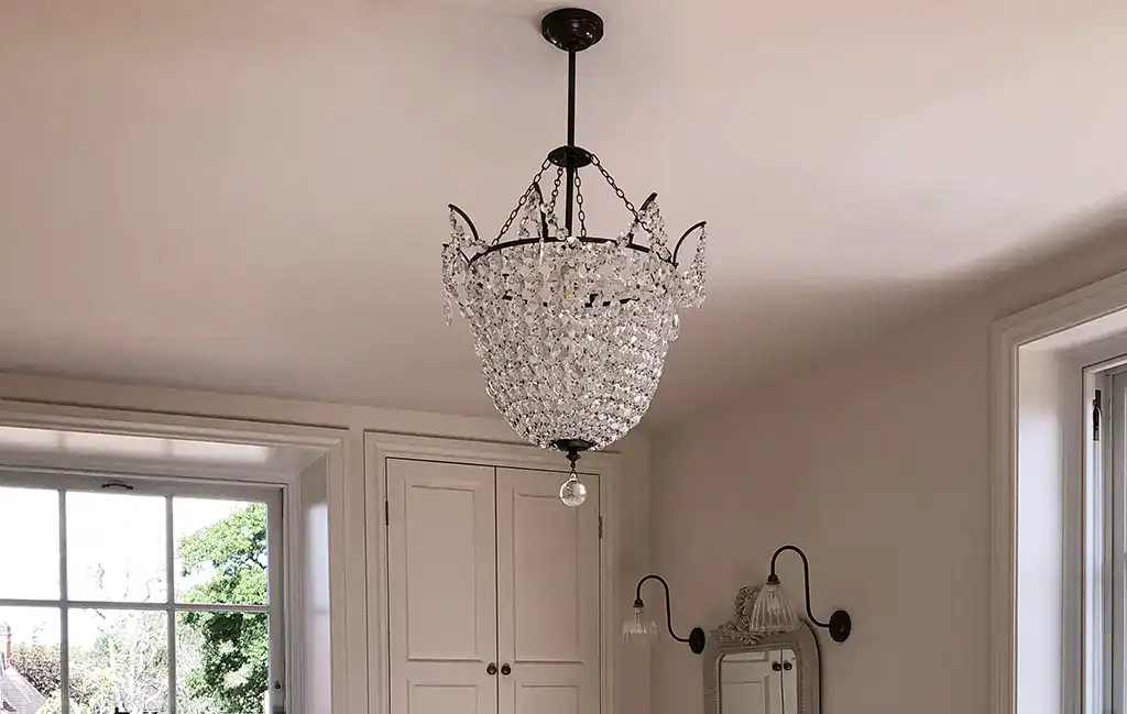 Elegant crystal chandelier in a modern living room.