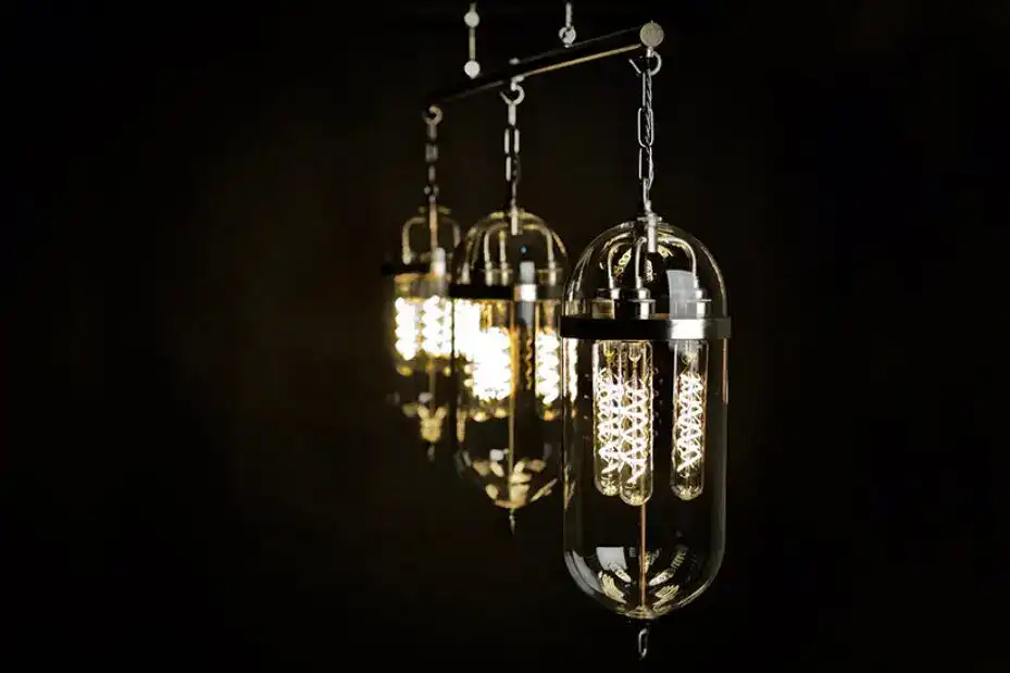 Modern pendant lighting fixtures with glass and metal design, ideal for contemporary interiors.