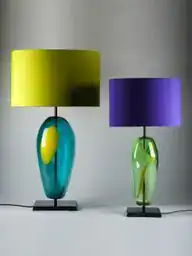 Stylish modern table lamps with colourful glass bases and vibrant lampshades.