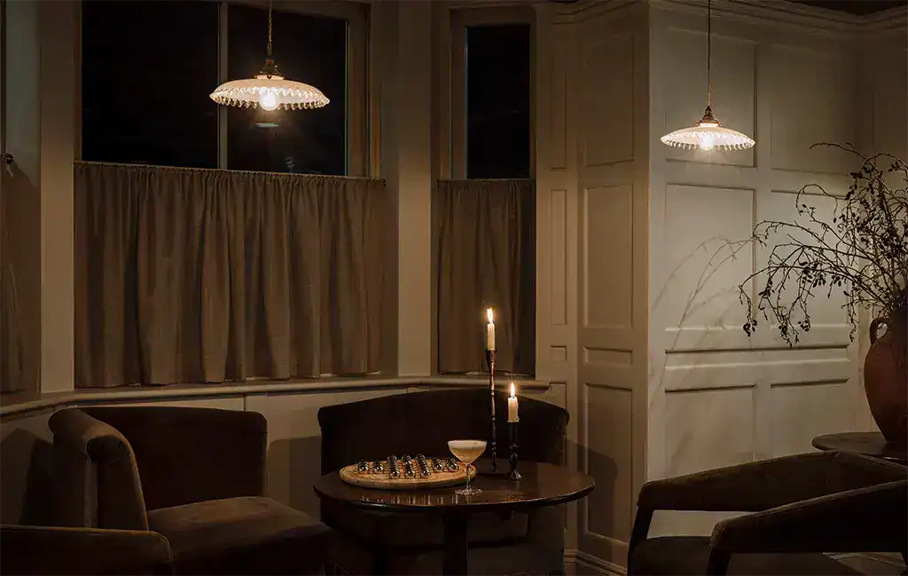 Elegant living room with modern pendant lighting.
