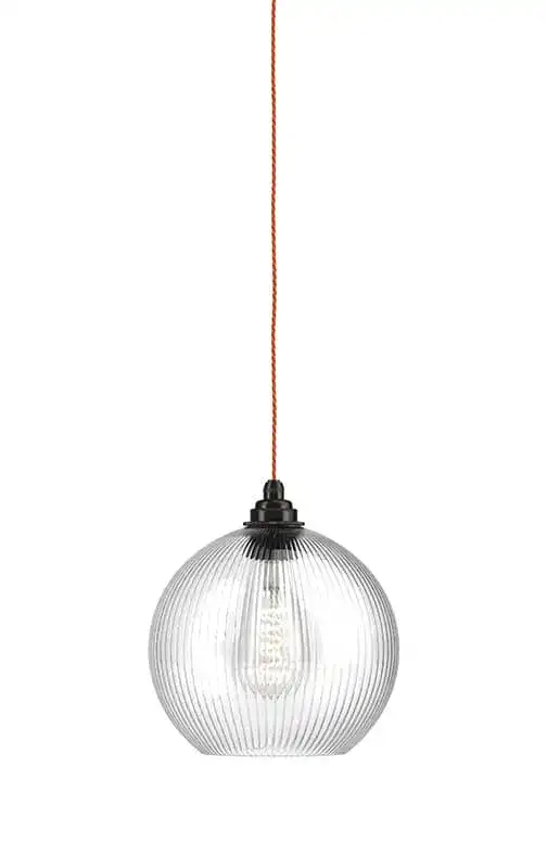 Pendant light with a clear ribbed glass globe and black fitting.
