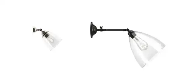 Wall-mounted industrial light fixture with clear glass shade.