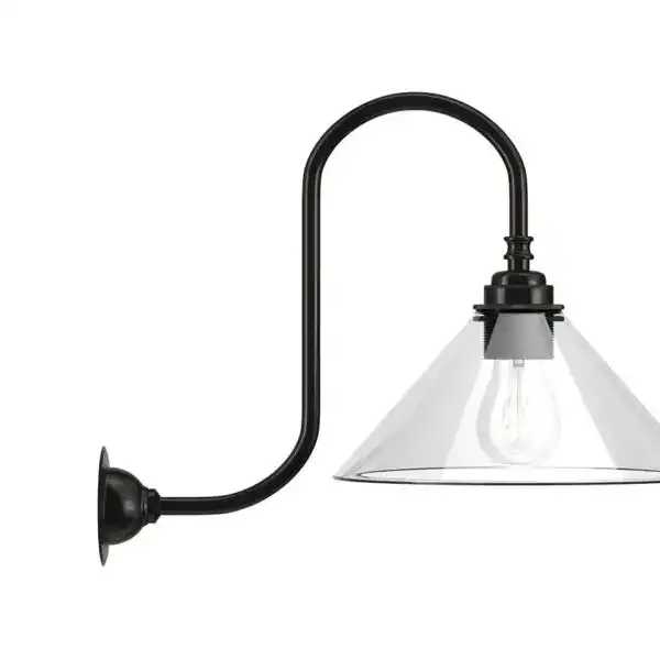 Wall-mounted industrial-style black metal light fixture with glass shade.