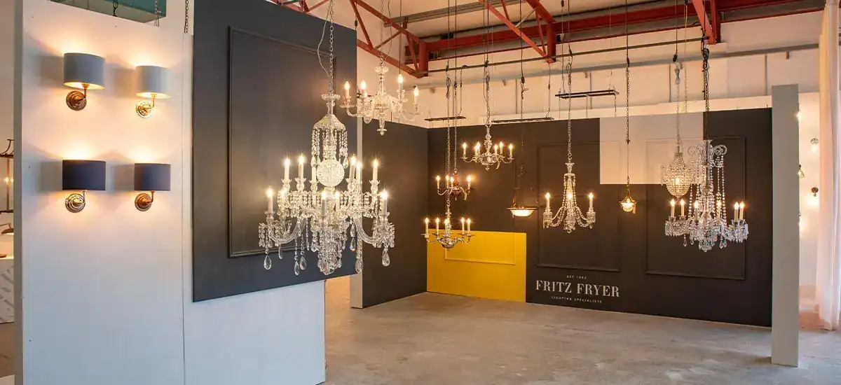 Elegant chandelier lighting display at Fritz Fryer UK showroom.