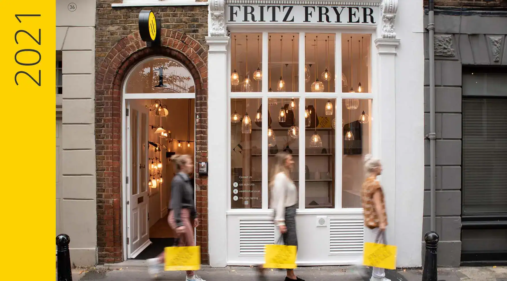Fritz Fryer Lighting UK shopfront with large display windows and illuminated interior lighting.