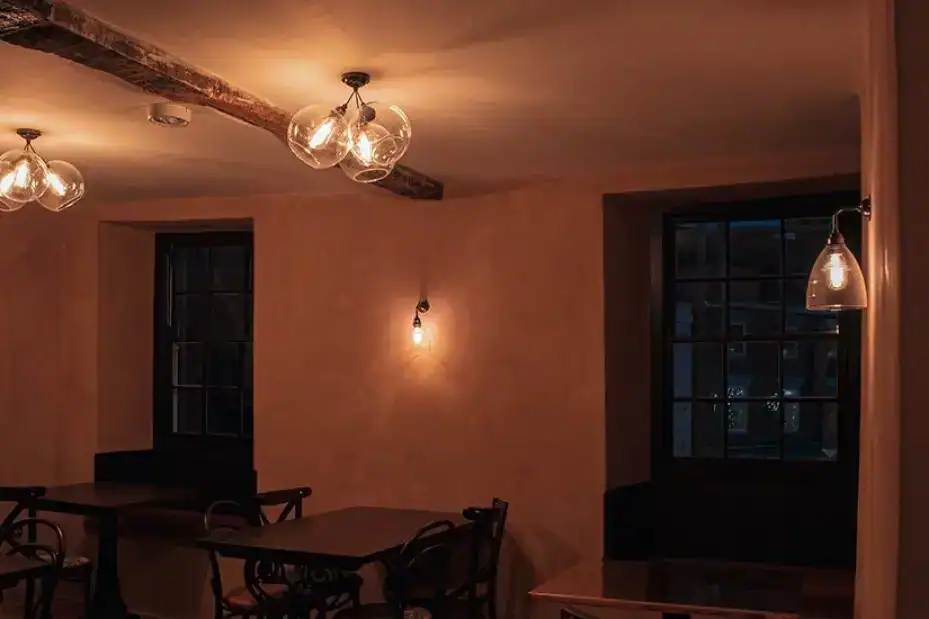 Elegant pendant lighting in a cozy dining area.