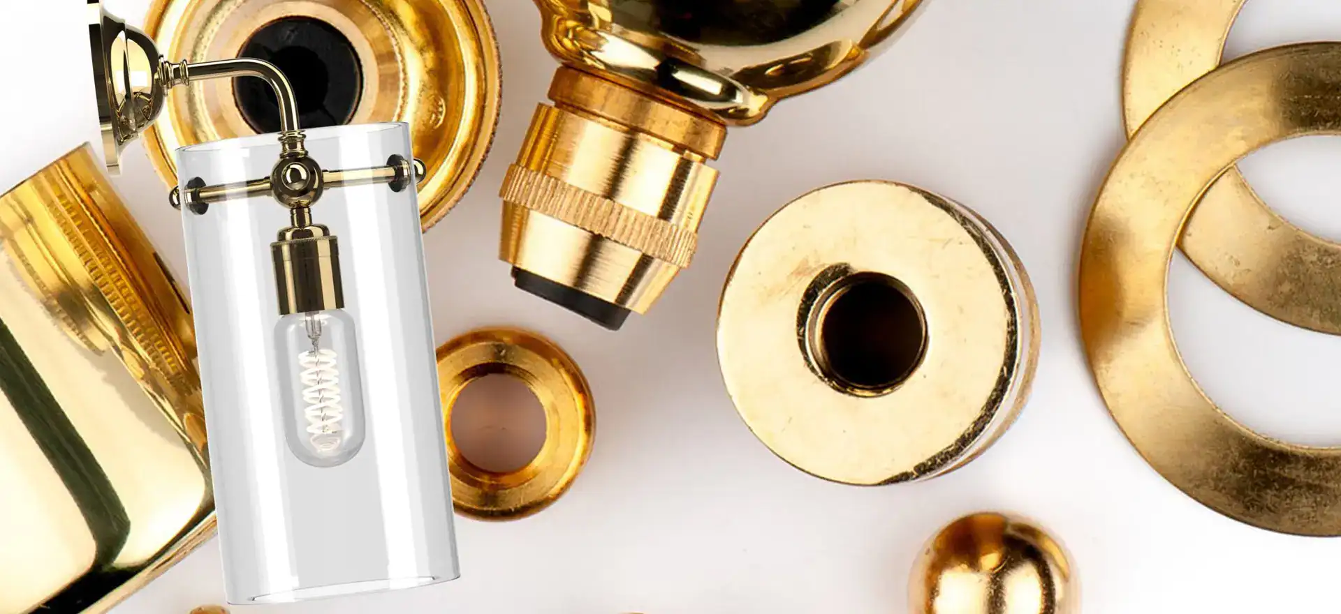 LED light bulb with gold fittings and accessories for lighting fixtures.
