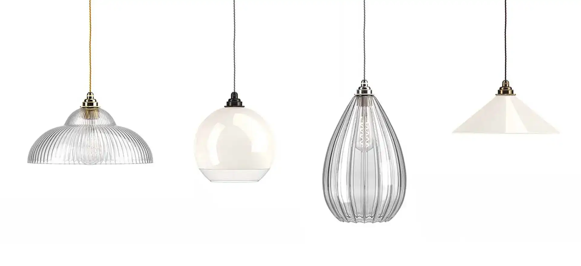 Pendant lights hanging in a row, showcasing contemporary design and various shapes.