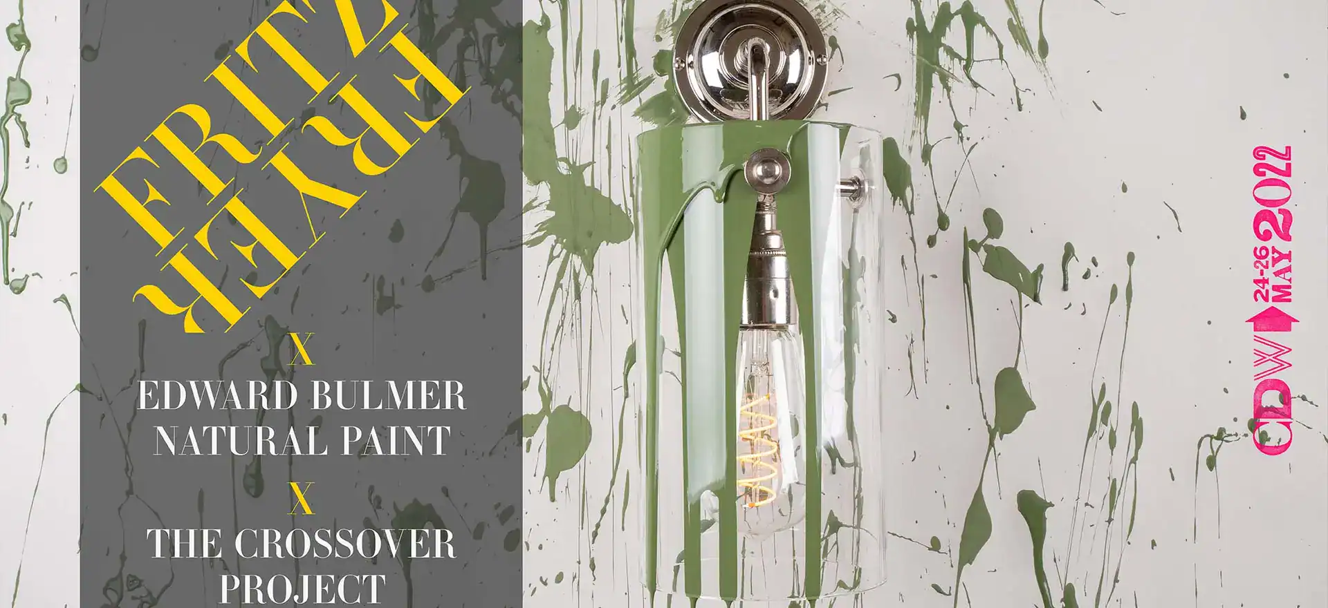Modern lighting fixture with green paint splatters and metallic details, part of Fritz Fryer UK coll.