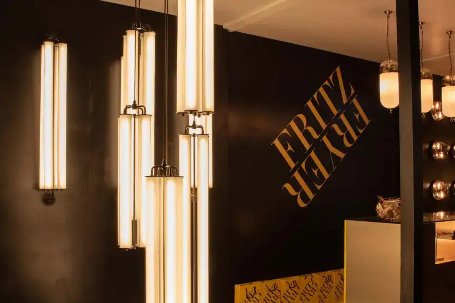 Elegant modern pendant lighting fixtures in a showroom display.