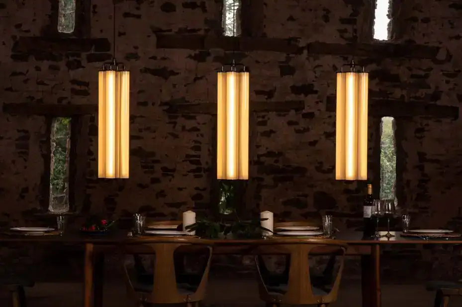 Modern pendant lighting over dining table.
