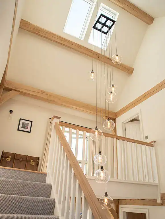 Elegant glass pendant lighting fixtures in a contemporary home interior.