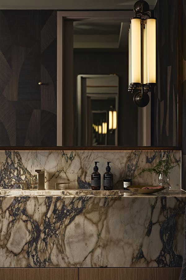 Modern bathroom wall light fixture by Fritz Fryer Lighting UK.