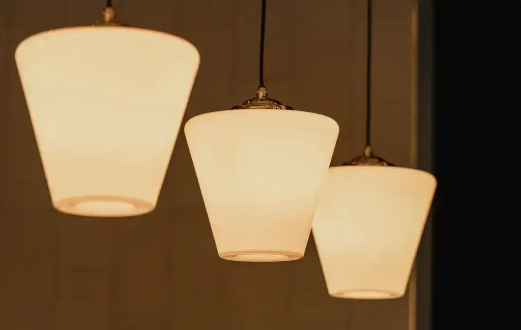 Soft white pendant lighting fixtures hanging from the ceiling.