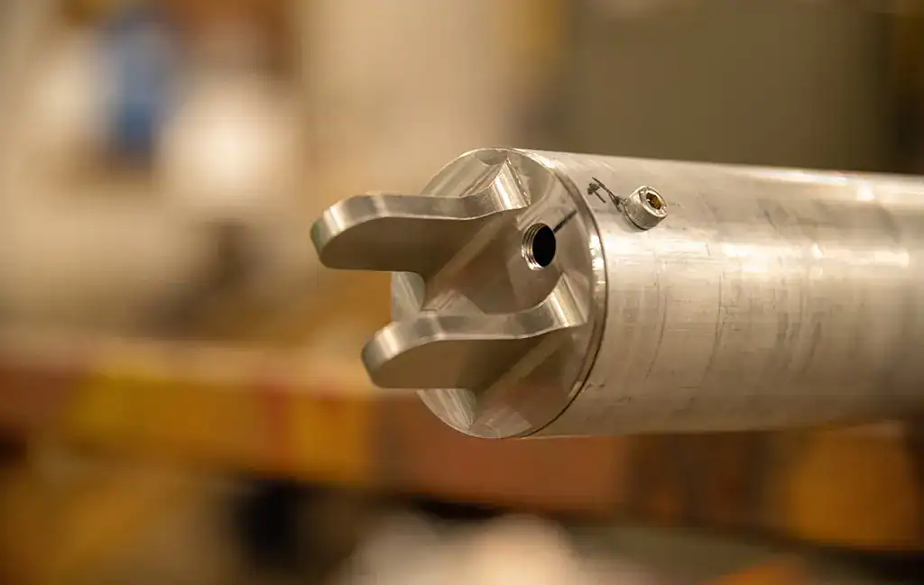 Precision metal component for lighting fixtures.