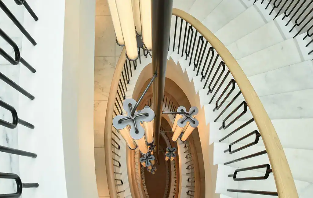 Staircase lighting fixture with modern design.