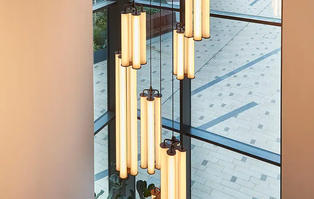Elegant vertical pendant lighting installation.