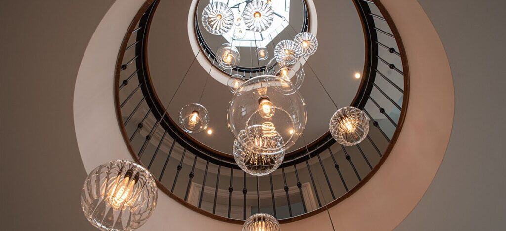 Stunning bespoke stairwell cluster chandelier