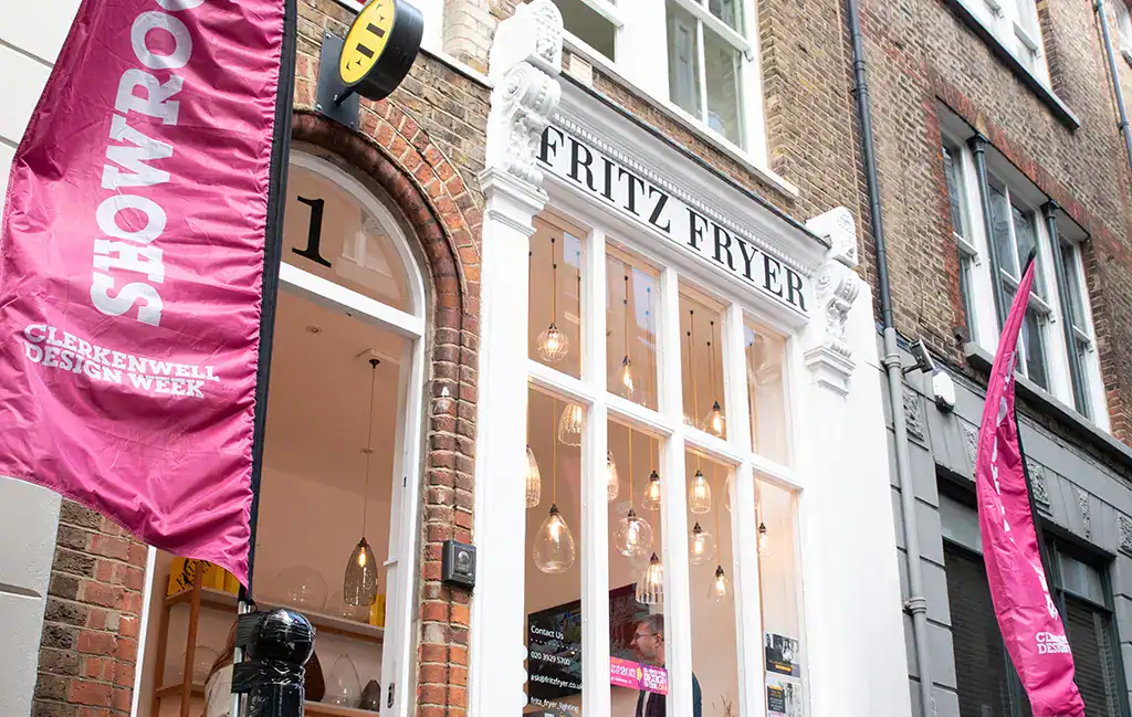 Exterior of Fritz Fryer's Clerkenwell showroom with Clerkenwell Design Week flags outside