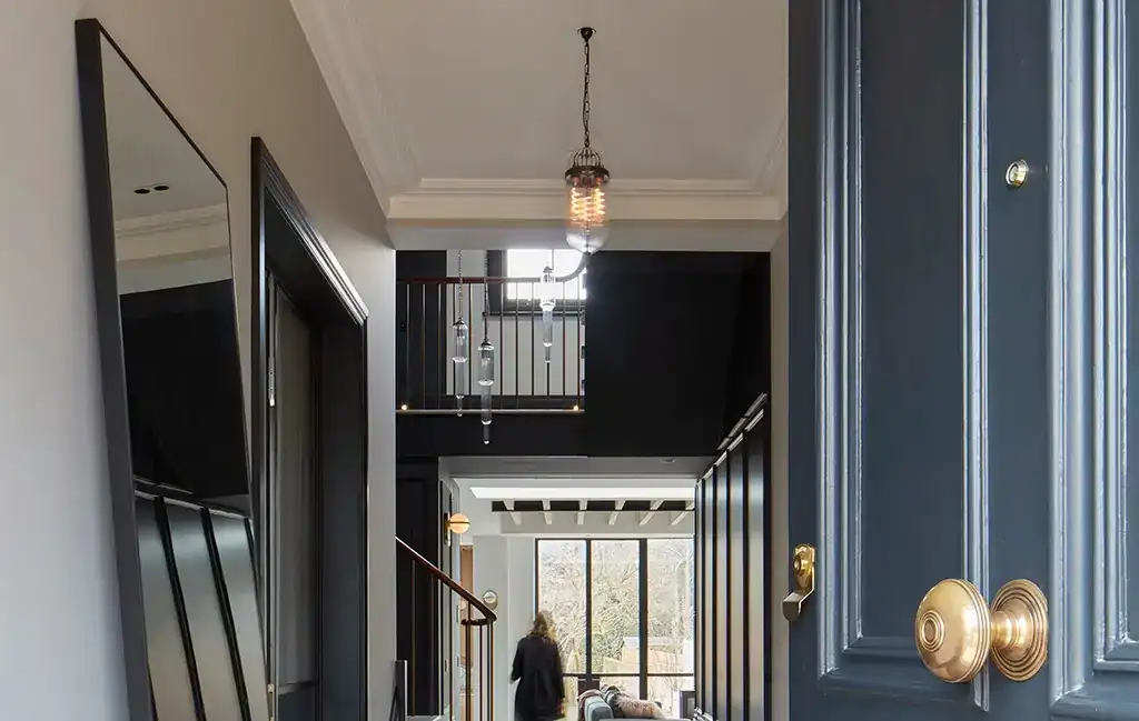 Single Aston Pendant in Dark-Painted Hallway