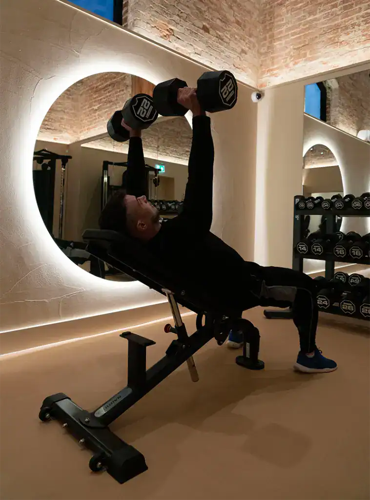 Gym lighting by a weights machine at The Woolfox in Leicestershire