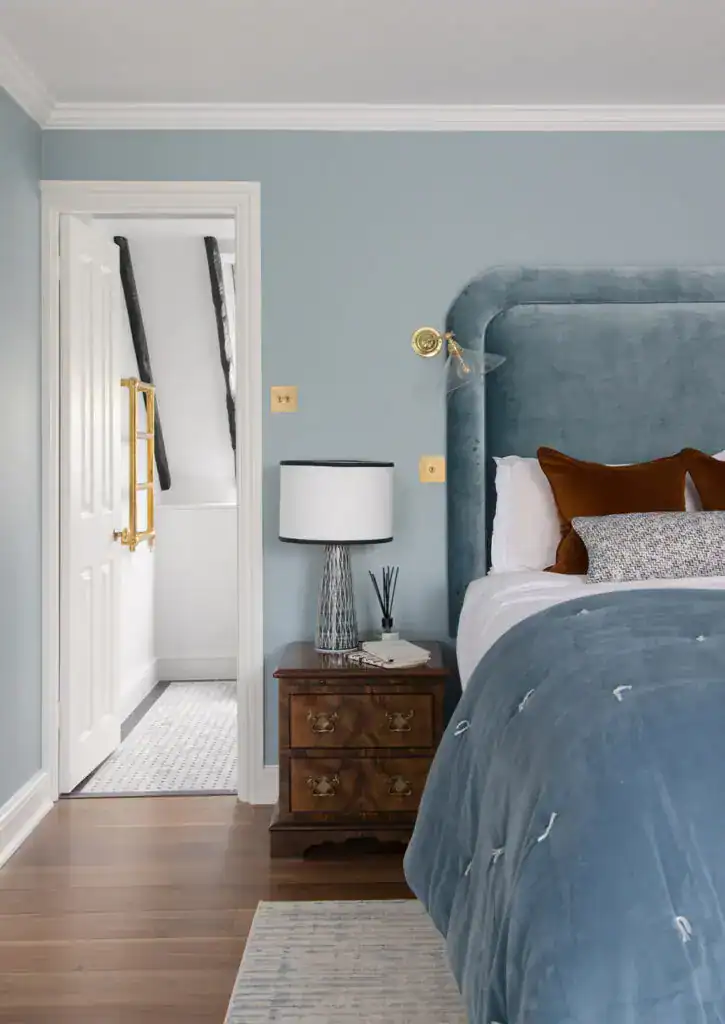 Elegant bedroom with modern lighting fixtures.