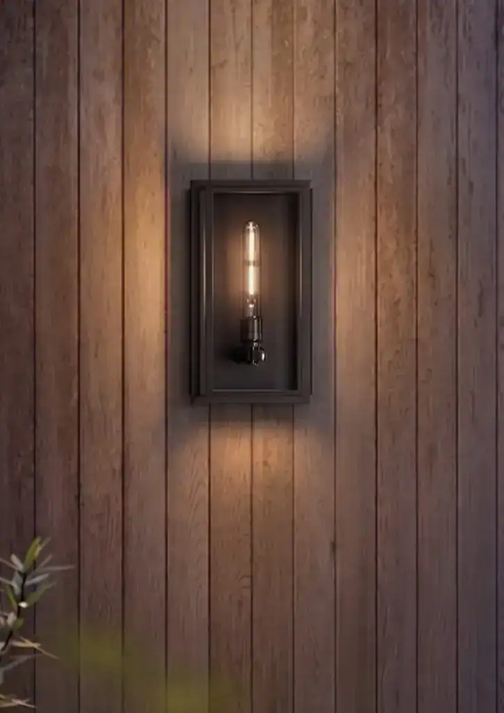 Wall-mounted vintage-style filament bulb light fixture.
