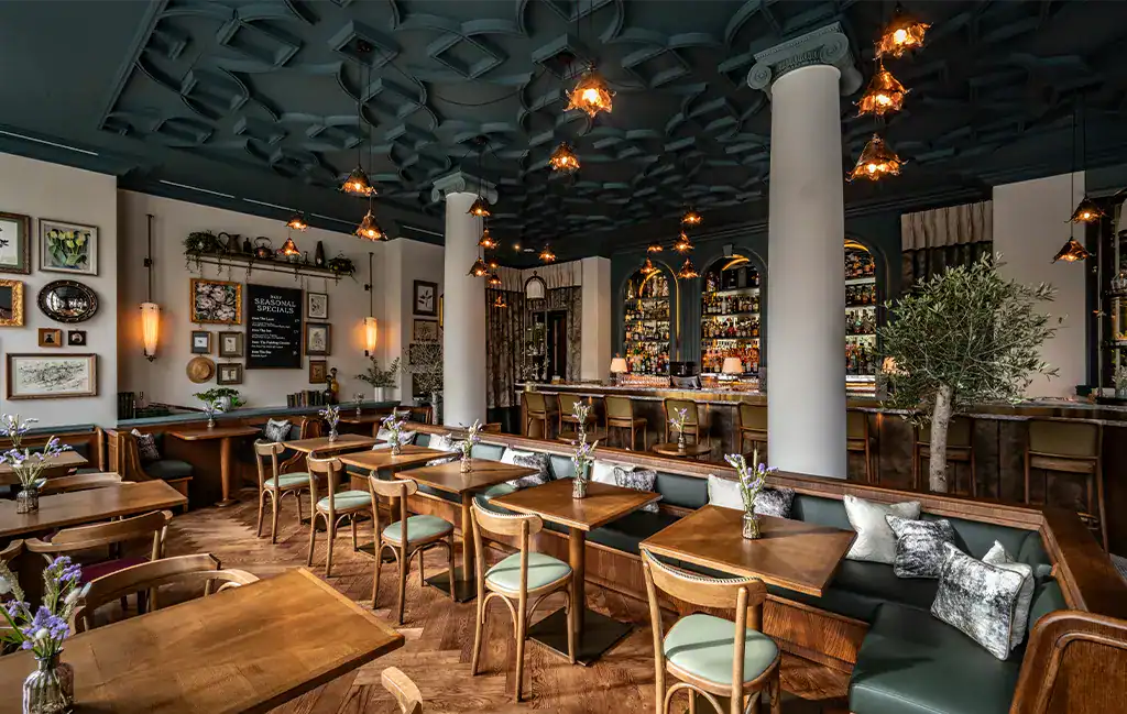 Elegant restaurant interior with stylish lighting and decor.